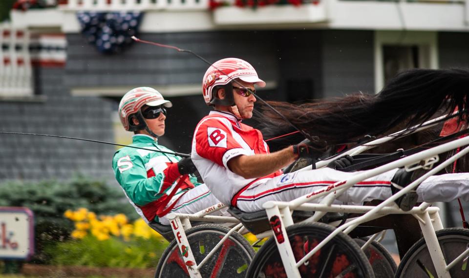 Driver Jason Bartlett driving Just For Luck in the New York Excelsior Series B 3-year-old colts and geldings first division race during the Grand Circuit races at the Goshen Historic Track in Goshen, NY on Sunday, July 4, 2021. Torrey Pines won the $6,500 purse. KELLY MARSH/For the Times Herald-Record