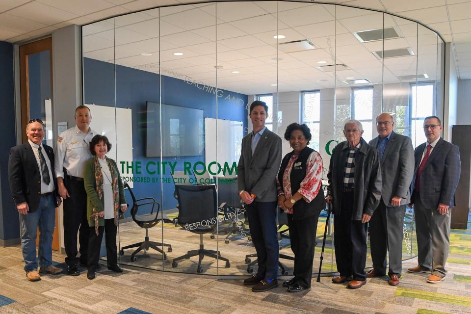 City of Columbia representatives toured the renovated library and posed in front of the City Conference Room located on the second floor. (From left) Ward 4 Council Member Kenny Marshall; Fire Chief Ty Cobb; Dr. Janet F. Smith, Columbia State President; Mayor Chaz Molder; Dr. Christa Martin, vice mayor of the City of Columbia and Columbia State assistant to the president for access and diversity; Former Mayor Dean Dickey; City Manager Tony Massey; and Assistant City Manager Thad Jablonski.