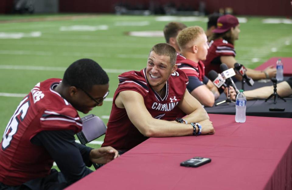South Carolina quarterbacks Luke Doty (9) and LaNorris Sellers (16) share a laugh during Media Day at the Spurrier Indoor Practice Facility in Columbia on Thursday, August 3, 2023.