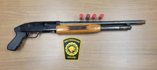Westborough police say they found this shotgun in the car of a stalking suspect.