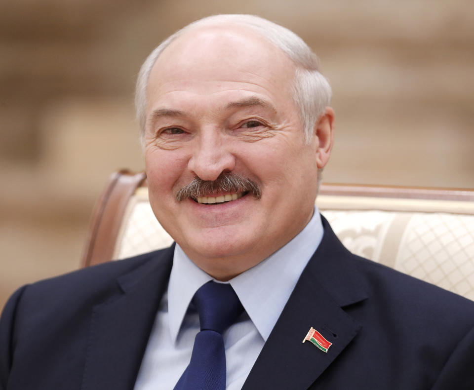 Belarusian President Alexander Lukashenko smiles during a news conference in Minsk, Belarus, Friday, Dec. 14, 2018. (Vasily Fedosenko/Pool Photo via AP)