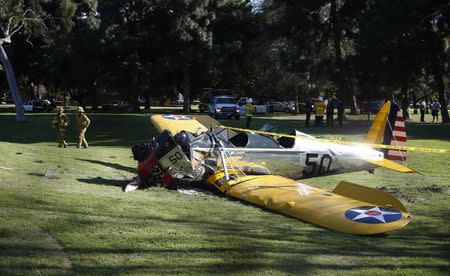 An airplane sits after crash landing at Penmar Golf Course in Venice California March 5, 2015. REUTERS/Lucy Nicholson