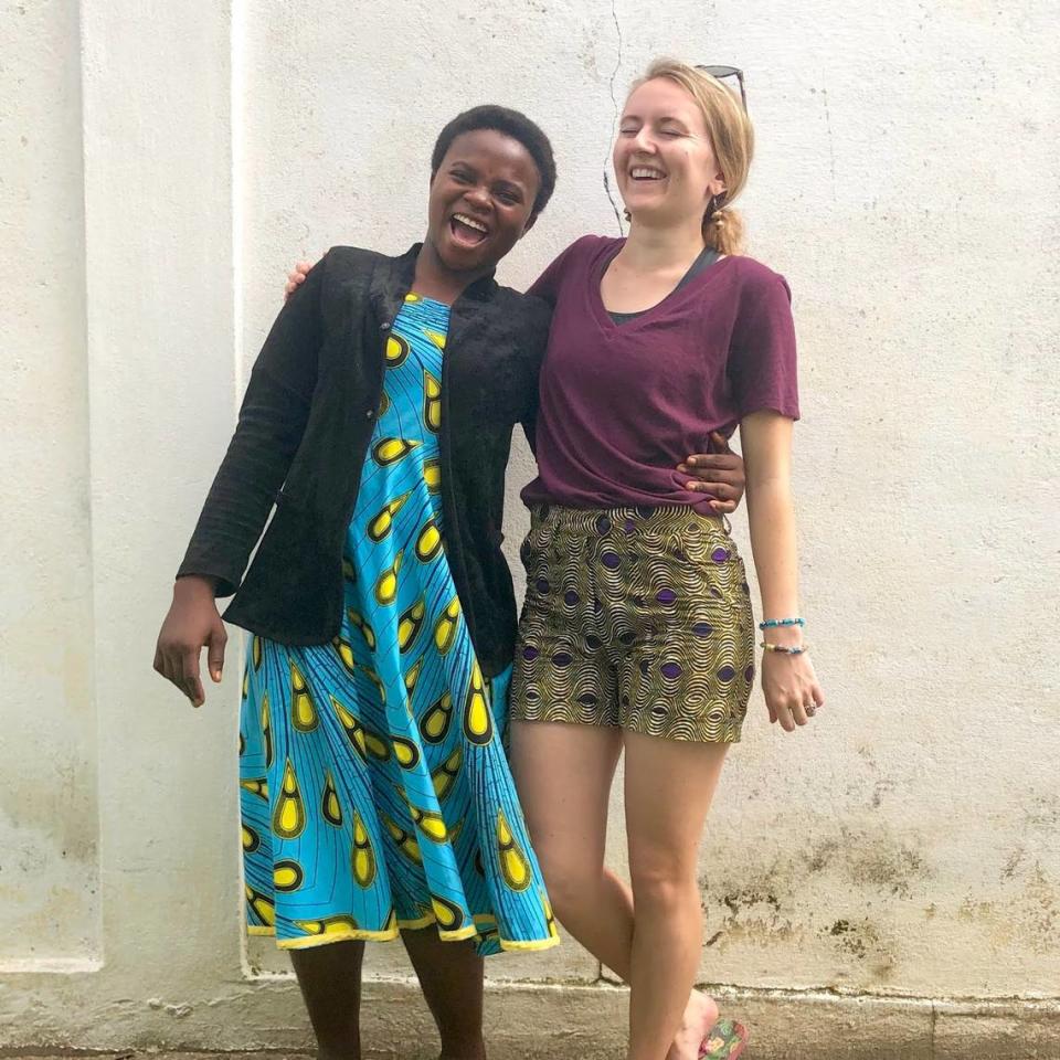 Payton McGriff, right, shares a laugh with Elolo Abalou, a 2021 graduate of the SHE program and now SHE’s assistant director in Togo.