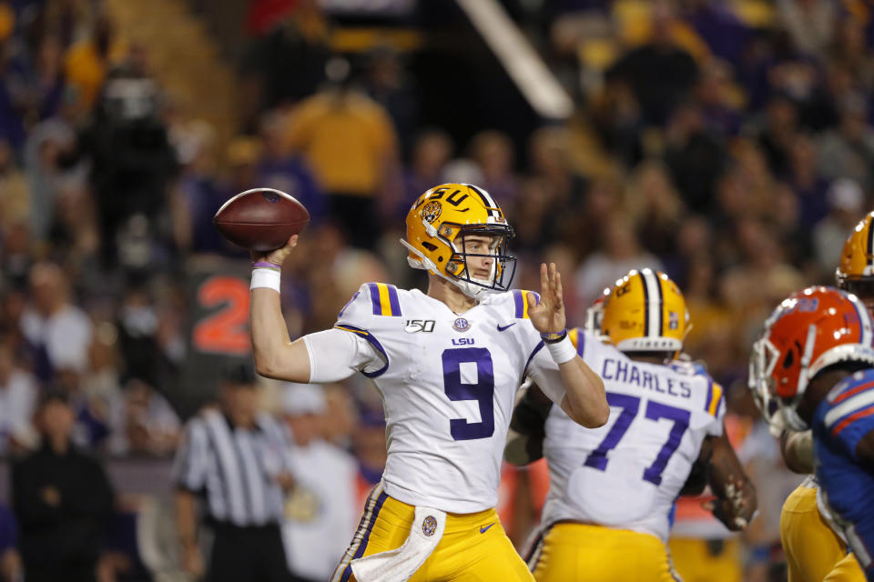 LSU quarterback Joe Burrow (9) passes in the first half of an NCAA college football game against Florida in Baton Rouge, La., Saturday, Oct. 12, 2019. (AP Photo/Bill Feig)