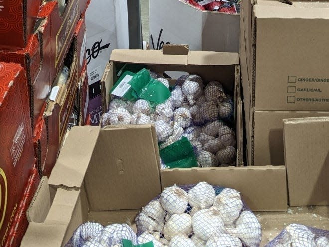 Packages of garlic in boxes at Costco