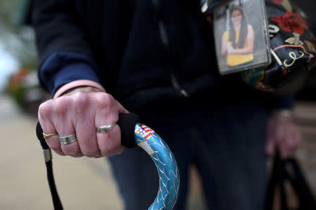 A woman's walking cane features a sticker of the U.S. flag in Northampton, Pennsylvania, U.S. April 24, 2017. Northampton County voted for Obama in 2008 and 2012, but Trump in 2016. REUTERS/Mark Makela