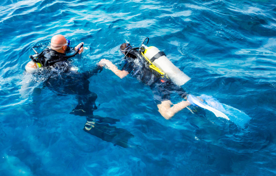 Two scuba divers in the water