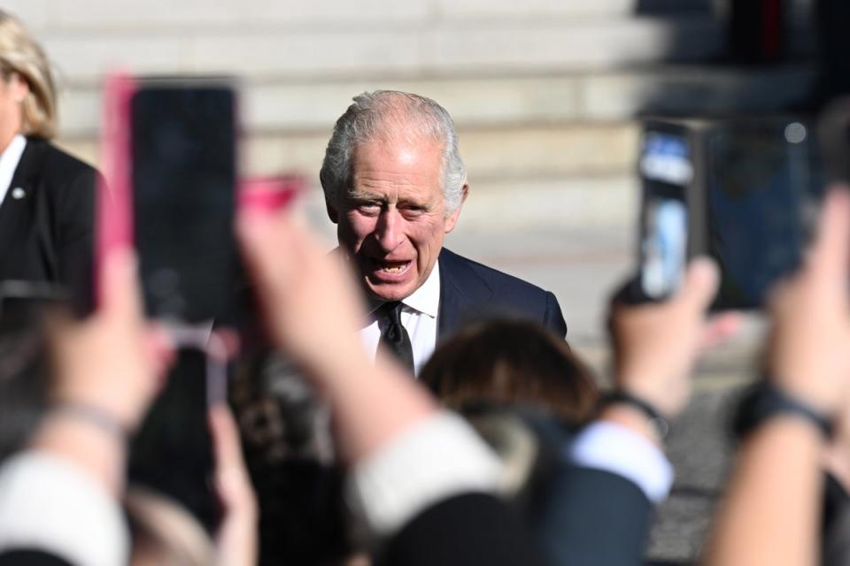 King Charles III greets well wishers outside St Anne’s Cathedral (Michael Cooper/PA) (PA Wire)