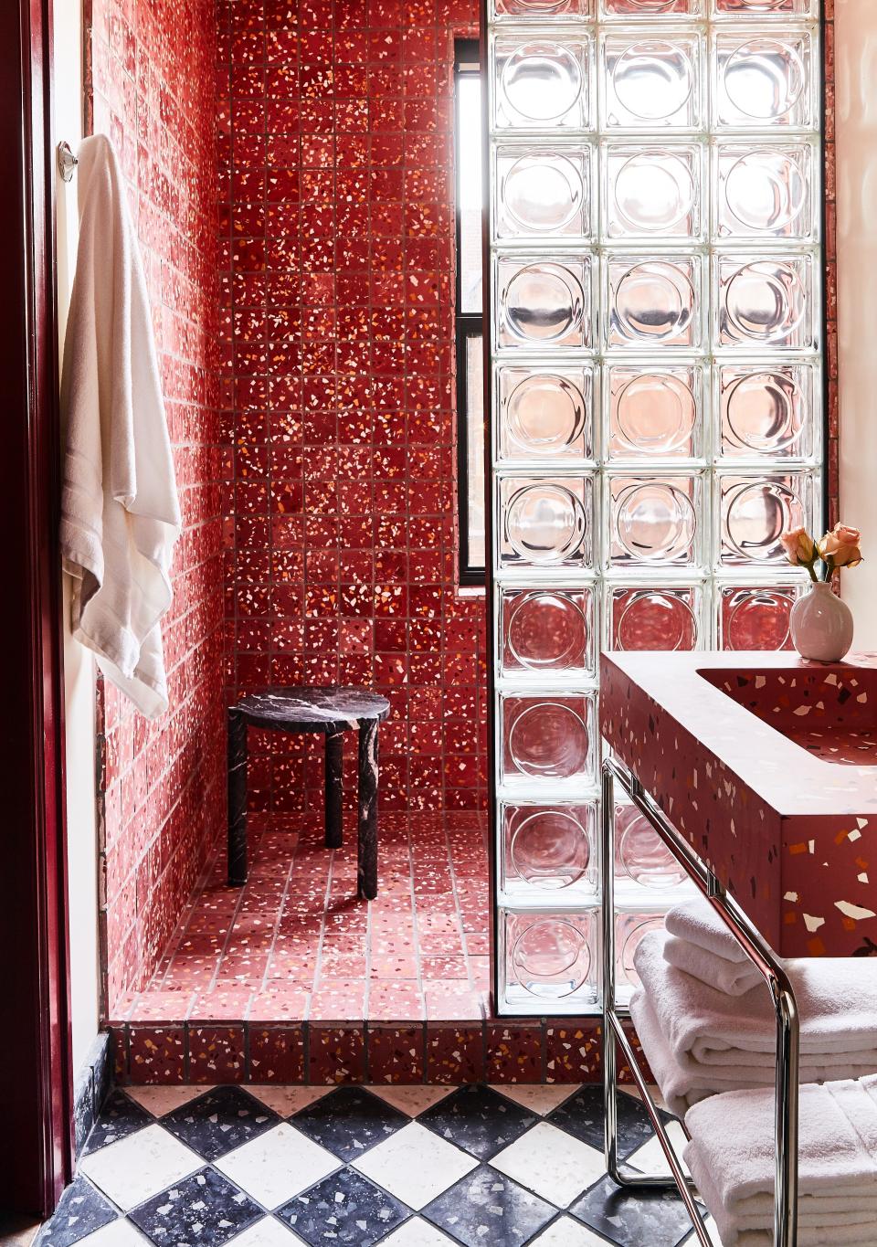 A terrazzo-and-glass block bathroom at the Siren.