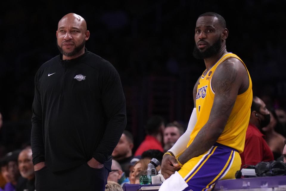 New coach Darvin Ham, left, and the Lakers are off to an 0-2 start but it's not too soon to see where the problem lies. LeBron James needs offensive firepower.