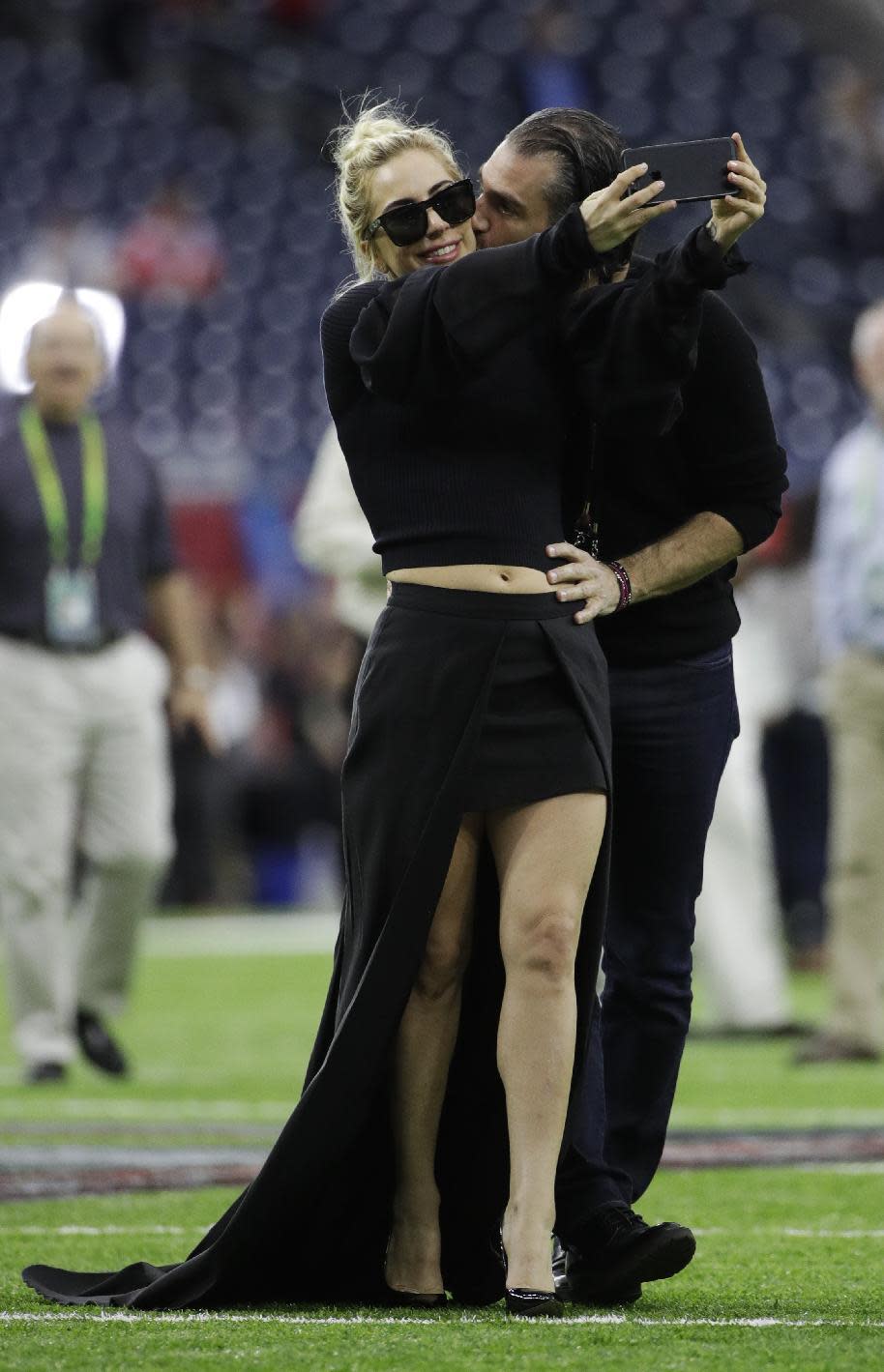 Lady Gaga takes a selfie with Christian Carino before the NFL Super Bowl 51 football game between the New England Patriots and the Atlanta Falcons, Sunday, Feb. 5, 2017, in Houston. (AP Photo/Jae C. Hong)