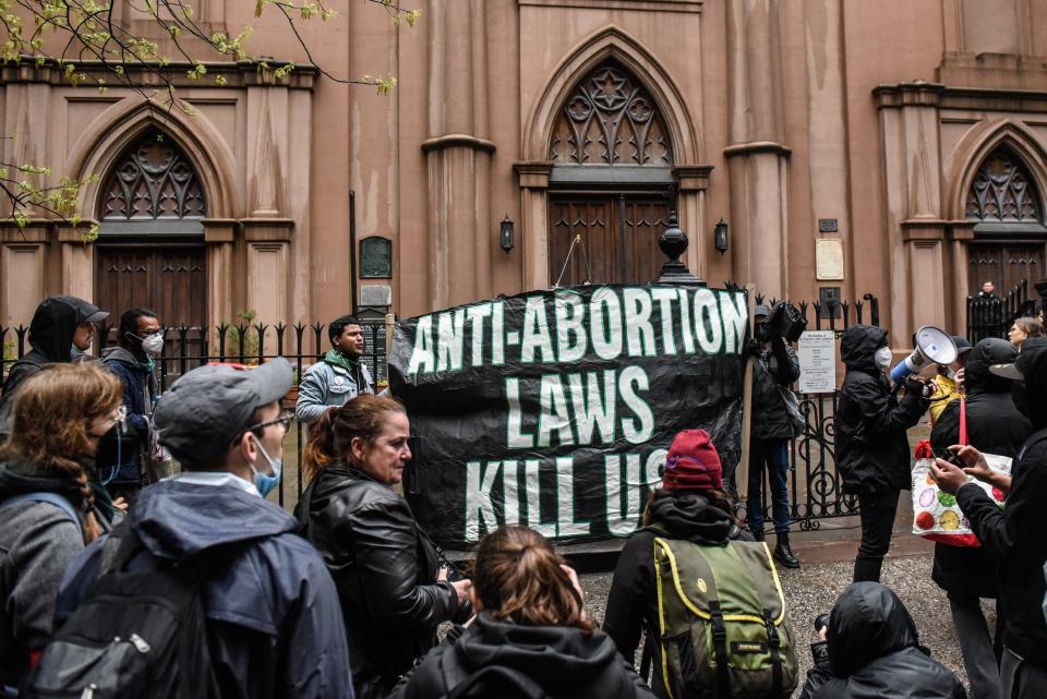 Abortion-rights supporters outside a Catholic church in downtown Manhattan on May 7, 2022, in New York City.