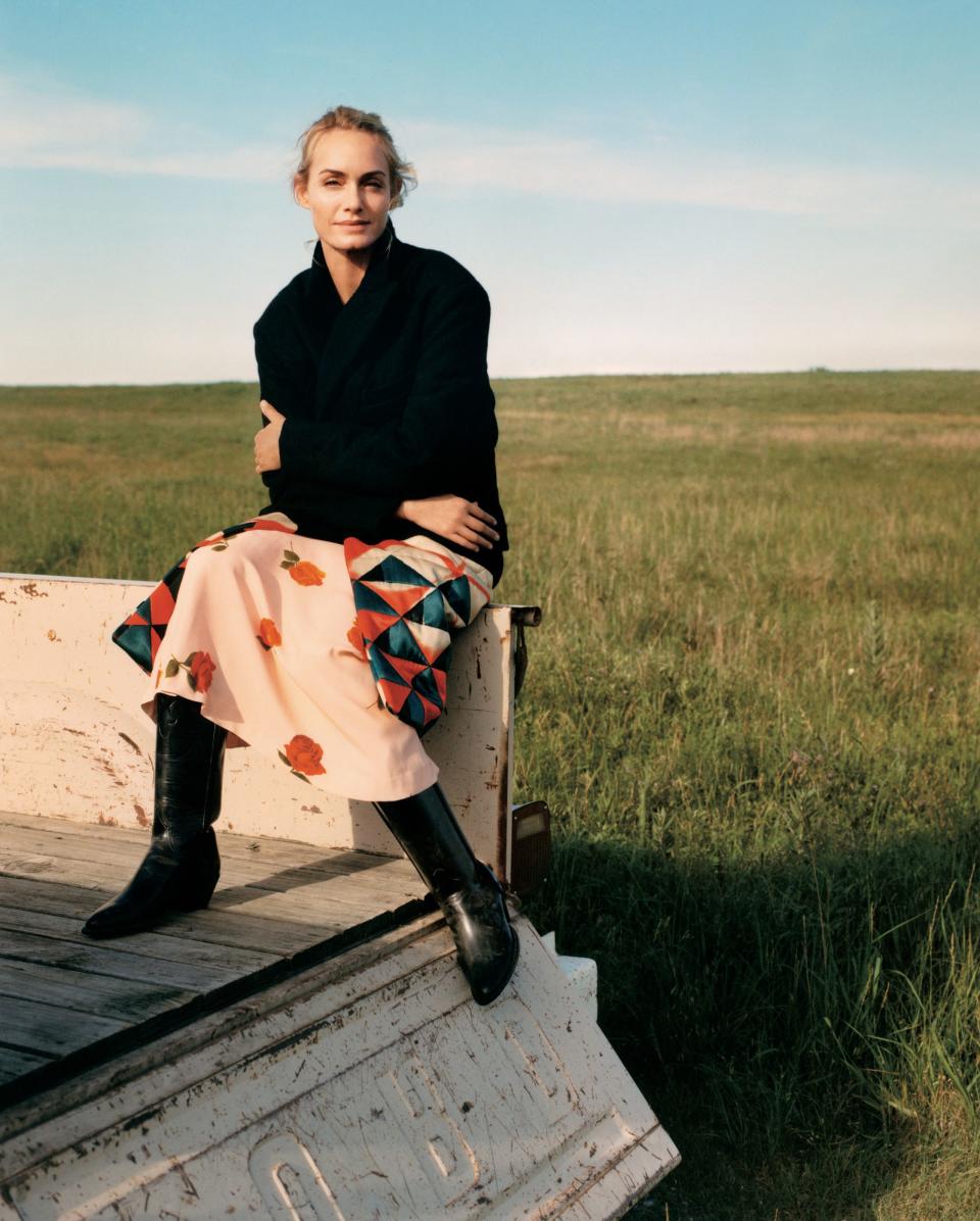 “Oklahoma girls are authentic, gutsy, kind, generous, and humble,” says Valletta. “I hope to embody all of those things and make OK proud.” Dries Van Noten coat ($2,945) and dress ($1,420); Barneys New York, NYC. Lucchese Bootmaker boots.