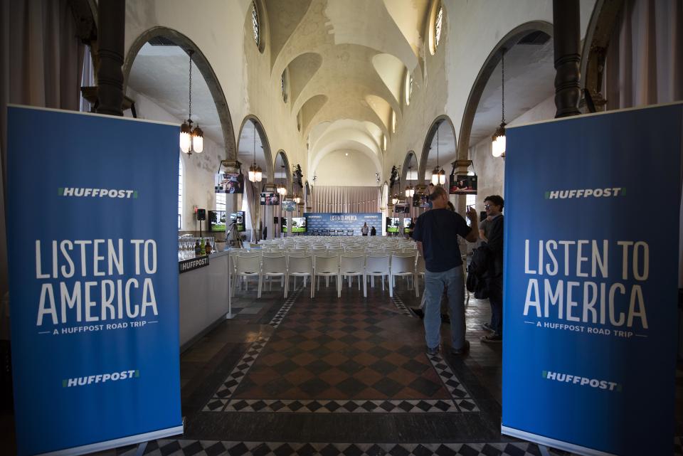 Staffers set up the&nbsp;HuffPost bus tour wrap party at Marigny Opera House.