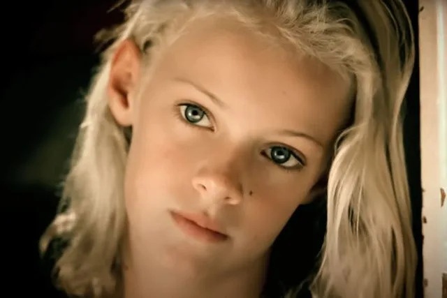 <p>Taylor Swift/ Youtube</p> Jaclyn Jarrett in Taylor Swift's "Mine" music video