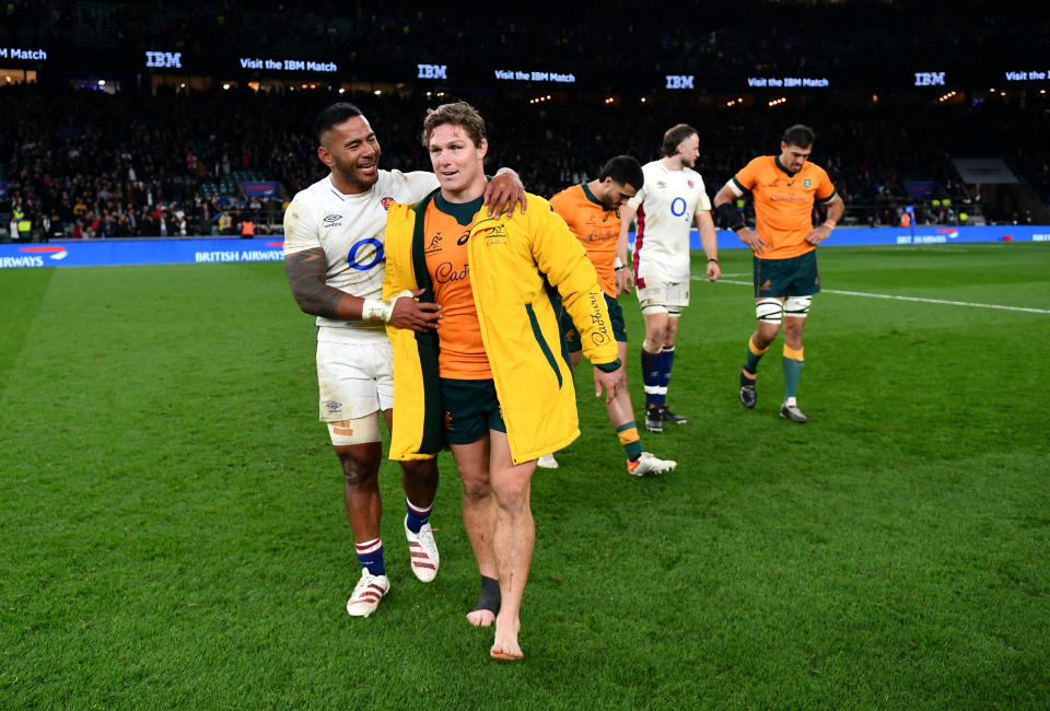 Pictured here, Manu Tuilagi of England and Michael Hooper of Australia speak after the Test match at Twickenham.