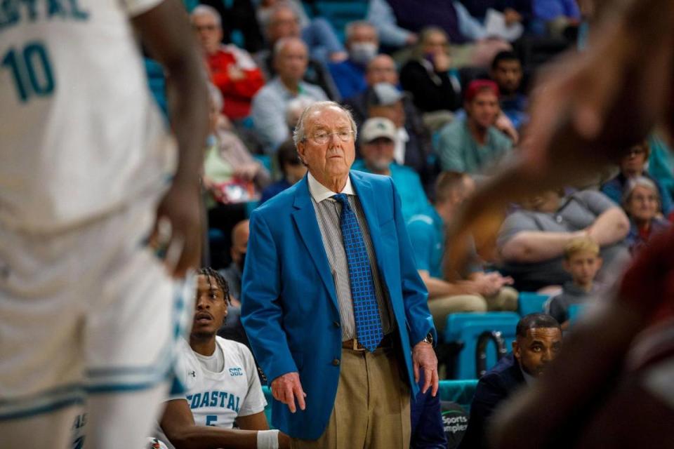 Coastal Carolina coach Cliff Ellis watches as his players trounce the South Carolina Gamecocks on Wednesday at the HTC Center. Ellis was honored with a tribute prior to tip-off for having 800 wins as an NCAA Division I head coach. Dec. 1, 2021.