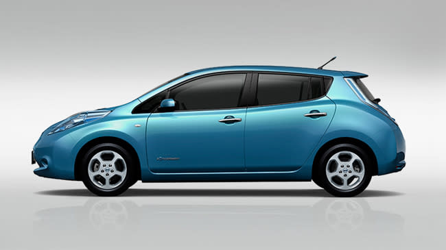  The Nissan Leaf car on a grey background. 