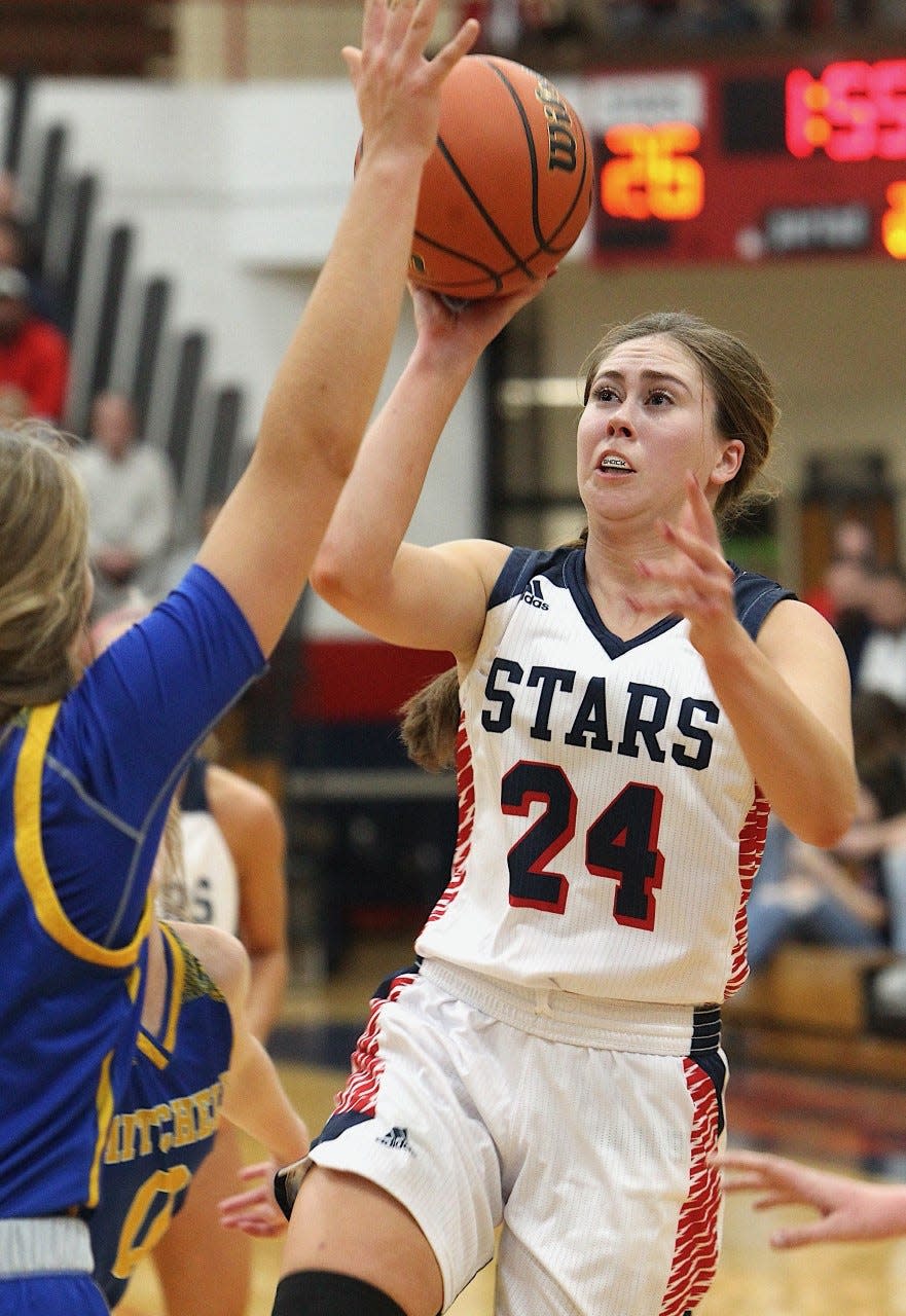 BNL senior Carlee Kern sinks a floater in the lane against Mitchell.