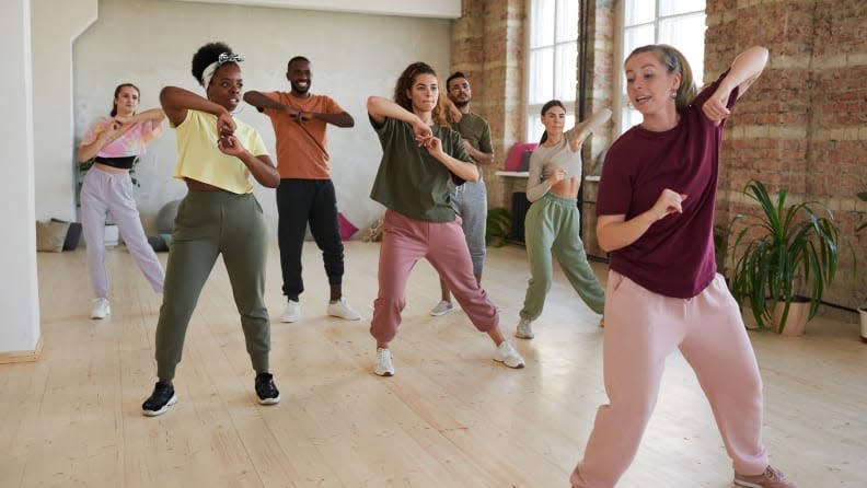 Credit:                      Getty Images / AnnaStills                                             Try a fun new workout like hula hooping, dancing, or trampolining.