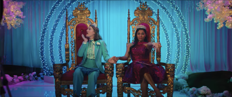 Emma and Alyssa sitting on prom thrones