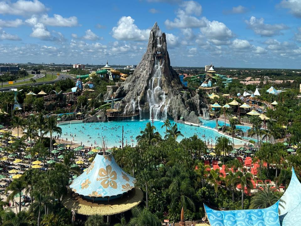 Volcano Bay water theme park. There is a large volcano with slides and a large pool.