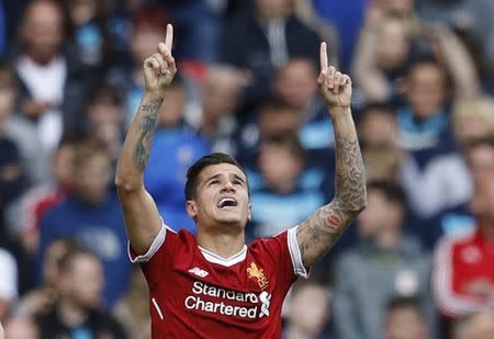 Britain Football Soccer - Liverpool v Middlesbrough - Premier League - Anfield - 21/5/17 Liverpool's Philippe Coutinho celebrates scoring their second goal Reuters / Phil Noble Livepic