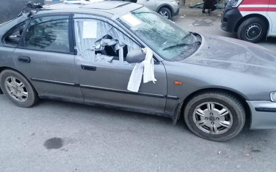 They tied white sheets to their car to make it clear they were fleeing civilians