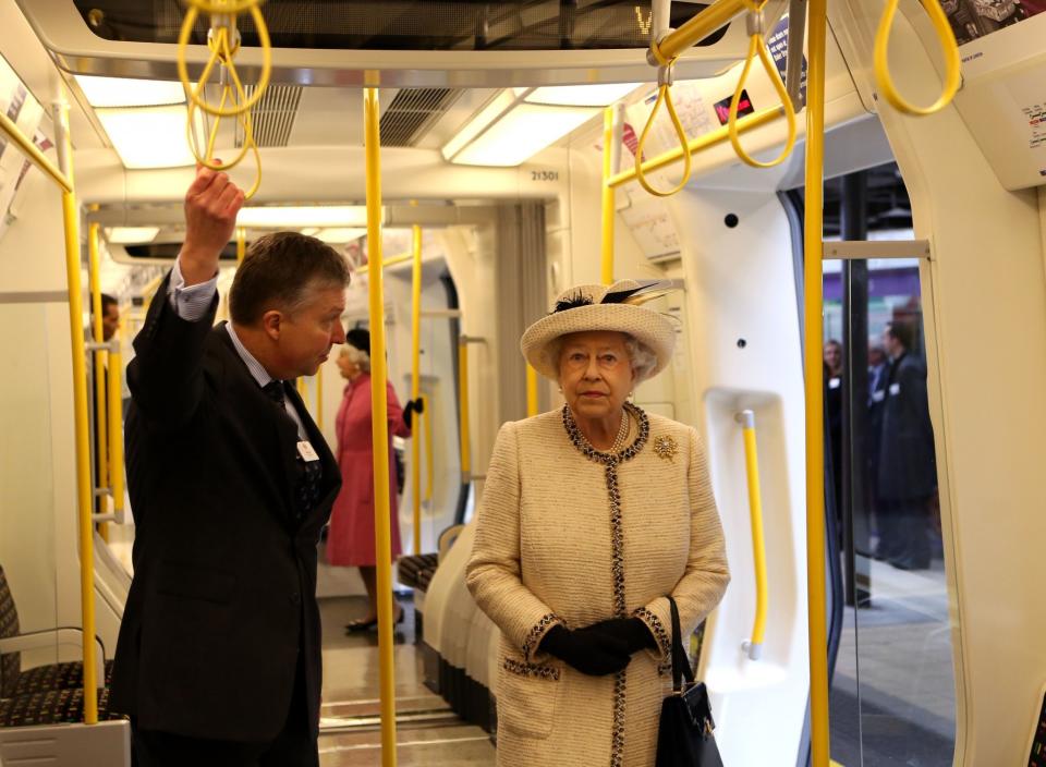 <p>Queen Elizabeth II rides the tube during a visit to Baker Street Tube Station to mark 150th anniversary of the London Underground. (PA) </p>