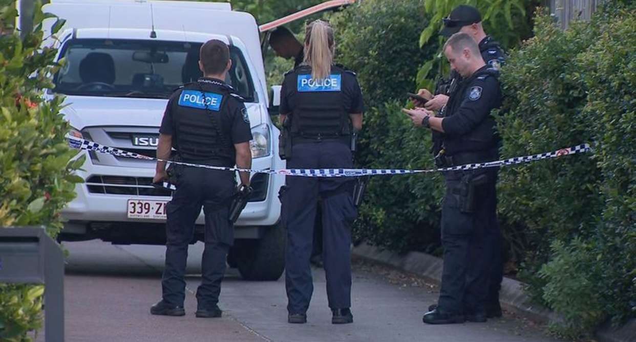 Police seen on York St in Nundah in Brisbane after a woman's body was found in a unit. 