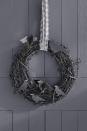 <p>It doesn't get too much creepier than an all-black wreath. Give your guests a solemn welcome to any Halloween party with this fun DIY. </p>