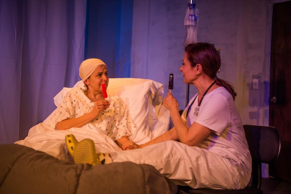 Shani Ferry stars as Vivian and Rose Gabriele plays nurse Susie Monahan in "Wit" at Western Reserve Playhouse.