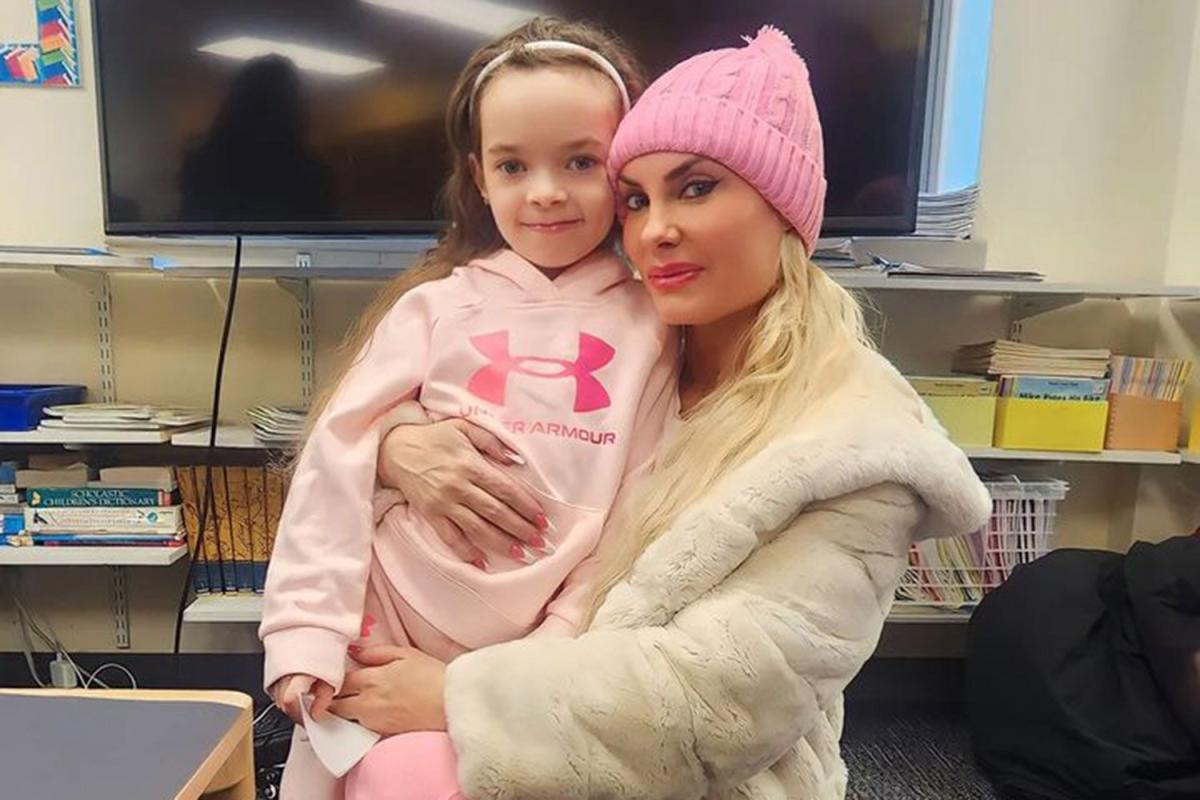 Coco Austin strikes a pose with her mini-me daughter Chanel as the