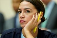 Rep. Alexandria Ocasio-Cortez (D-NY) listens as David Marcus, CEO of Facebook’s Calibra, testifies to the House Financial Services Committee in Washington.