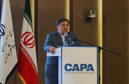 FILE PHOTO: Iran's Roads and Urban Development Minister Abbas Akhoundi speaks to foreign investors at the CAPA Iran Aviation Summit in Tehran, Iran, September 18, 2016. REUTERS/Tim Hepher/File photo