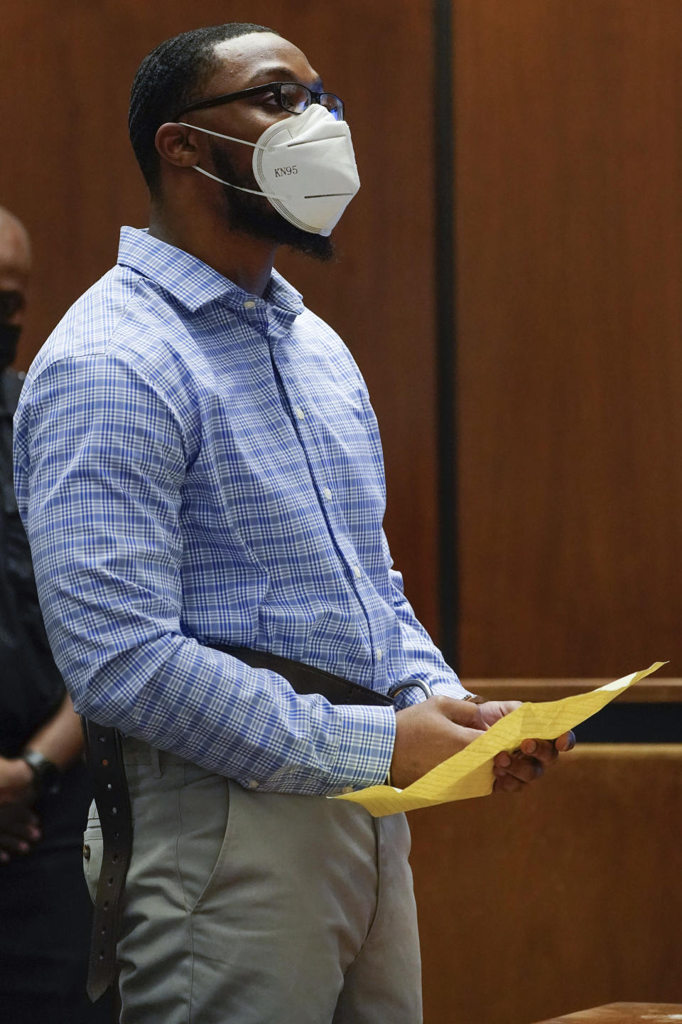 Khalil Wheeler-Weaver, 25, reads a statement during his sentencing in Newark, N.J., Wednesday, Oct. 6, 2021. The New Jersey man who used dating apps to lure three women to their deaths and attempted to kill a fourth woman five years ago was sentenced to 160 years in prison on Wednesday, as he defiantly proclaimed his innocence. (AP Photo/Seth Wenig, Pool)