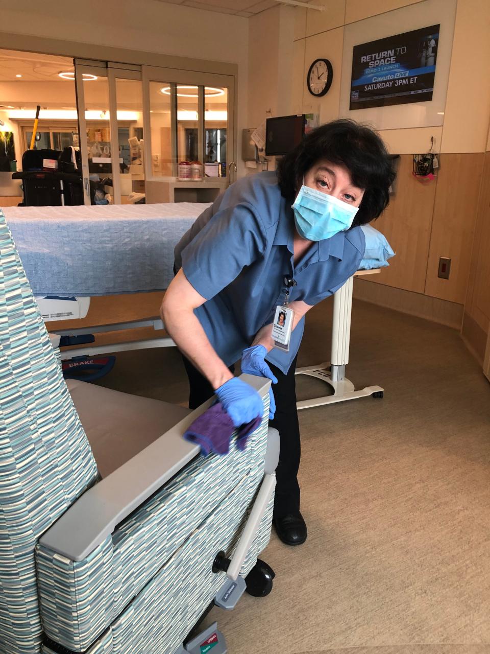 Sherrie Kendall, an EVS worker in Kirkland, Washington, said despite worries about potentially contracting coronavirus, working in a hospital gives her a sense of purpose during the pandemic.