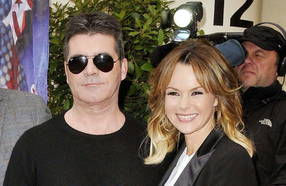 Simon Cowell and Amanda Holden's children pushed the Britain's Got Talent golden buzzer to send an act through to the show's semi-finals credit:Bang Showbiz