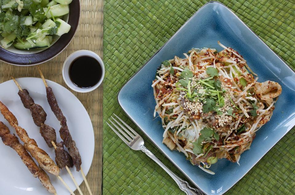 Biang Biang Noodles, beef and chicken skewers and cucumber salad from Jiu Thai Asian Cafe.