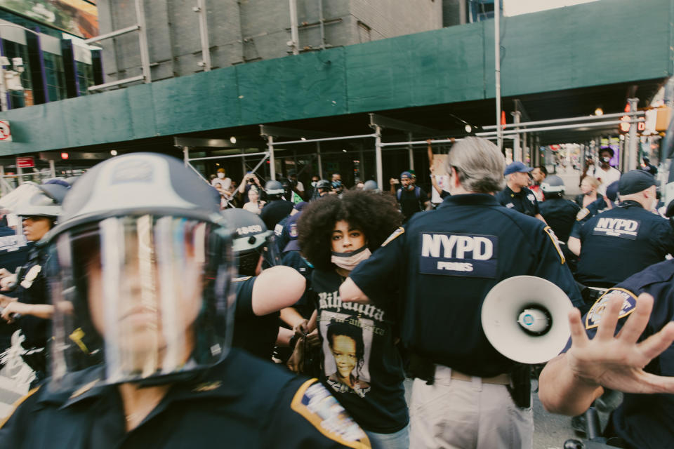 Ria Foye as she is arrested in Times Square after peacefully marching from Harlem on May 30. She was detained for more than seven hours. | Mark Clennon