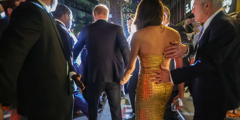 new york, united states may 16 duchess of sussex meghan markle and duke of sussex prince harry attend the ceremony, which benefits the ms foundation for women and feminist movements, in new york, united states on may 16, 2023 meghan markle who wears a gold dress for women of vision gala receives 2023 women of vision award from gloria steinem at ziegfeld ballroom on tuesday night in new york city photo by selcuk acaranadolu agency via getty images