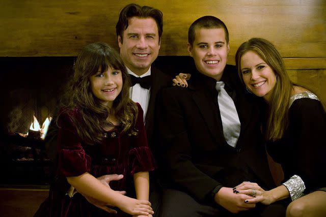 <p>Rogers and Cowan via Getty</p> Travolta's son Jett (pictured with his wife Kelly Preston and their daughter Ella) died in 2009