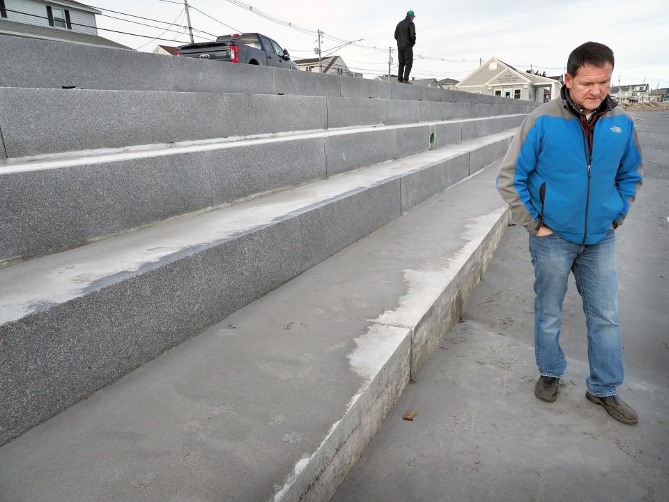 The town is seeking $1.1 million for the continued replacement of the Long Sands Beach seawall and sidewalk. Pictured is Department of Public Works Director Dean Lessard, in this file photo, talks about the granite footings of the new seawall that is being built in phases.
(Photo: Rich Beauchesne/File photo)