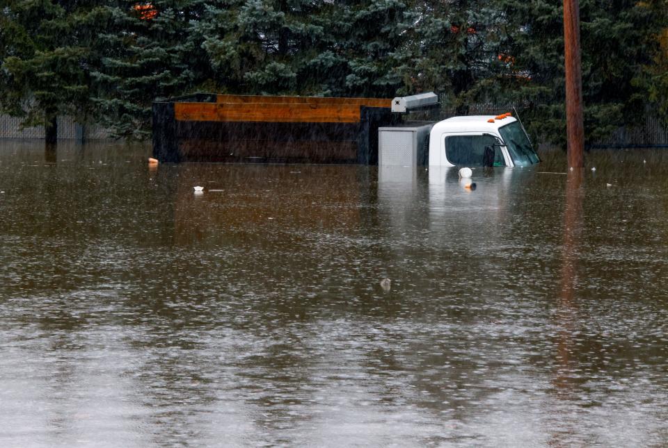 A truck is submerged in flood water on Nepperhan Avenue in New York after a large rainstorm (Getty Images)