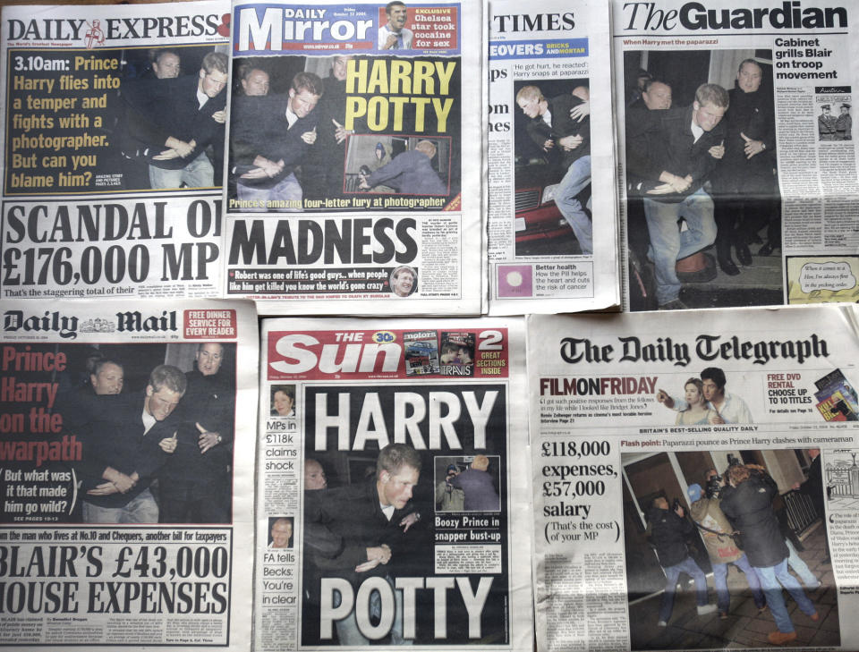 FILE - A montage of the front pages of Britain's national newspapers on Oct. 22, 2004, where photos of Prince Harry's altercation with a photographer outside a central London night spot, in the early hours of Thursday morning, dominated. An explosive memoir reveals many facets of Prince Harry, from bereaved boy and troubled teen to wartime soldier and unhappy royal. From accounts of cocaine use and losing his virginity to raw family rifts, “Spare” exposes deeply personal details about Harry and the wider royal family. It is dominated by Harry's rivalry with brother Prince William and the death of the boys’ mother, Princess Diana in 1997. (AP Photo/Adam Butler, File)