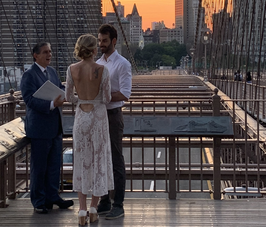 A woman tracked down a newlywed couple on social media after taking the only photo of their intimate ceremony. (Photo: Twitter)