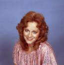 <p>In 1976, Reba looked every bit the doe-eyed bombshell during a portrait session in Nashville, Tennessee.</p>