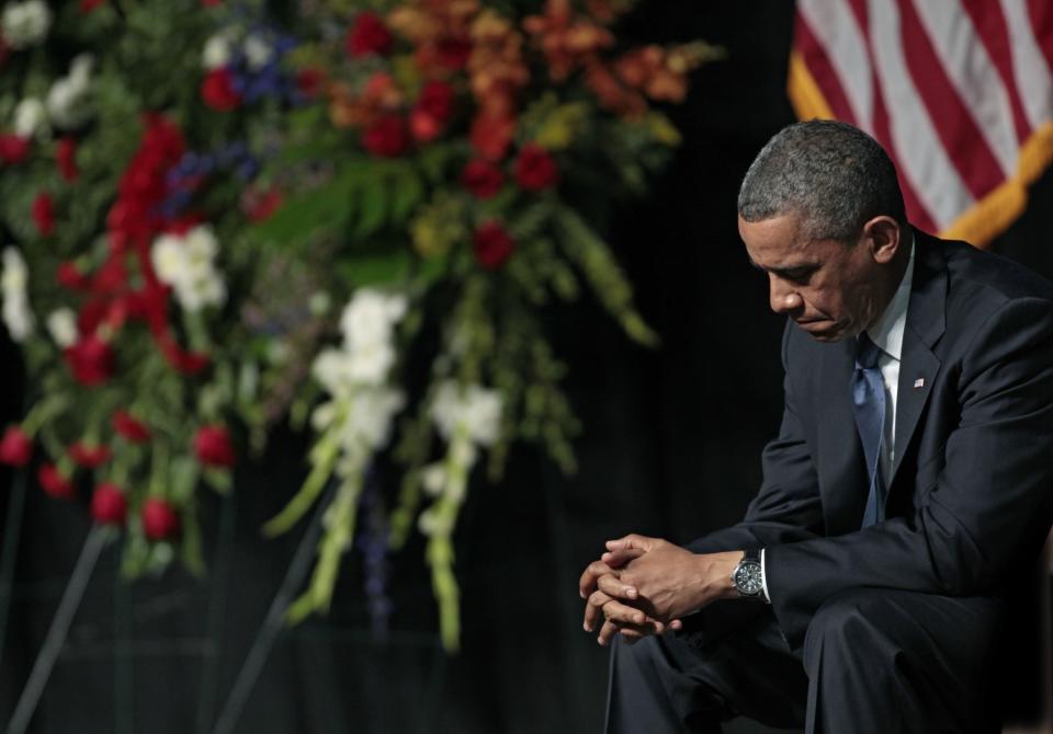 President Barack Obama bows his head at the West memorial service held at Baylor University April 25, 2013 in Waco, Texas.(Photo: Erich Schlegel/Getty Images)