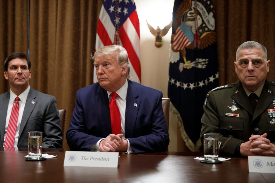 President Donald Trump and Chairman of the Joint Chiefs of Staff Gen. Mark Milley in the Cabinet Room at the White House in Washington, Monday, Oct. 7, 2019.