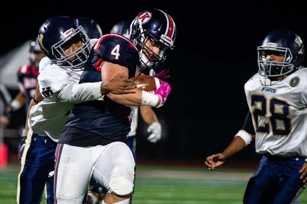 Ketcham's James Antonelli gets sacked during the Section 1 football game at Roy C. Ketcham High School in Wappingers Falls, NY on Friday, September 9, 2022. Yonkers defeated Ketcham 32-6. KELLY MARSH/FOR THE POUGHKEEPSIE JOURNAL